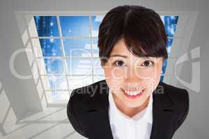 Composite image of businesswoman smiling