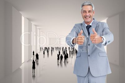 Composite image of positive handsome businessman