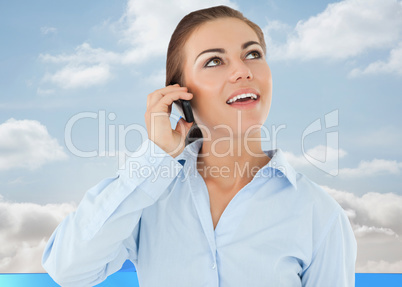 Composite image of smiling businesswoman looking upwards while o