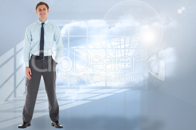 Composite image of smiling businessman standing with hand in poc