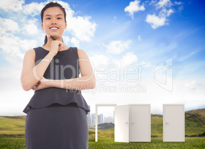 Composite image of thinking asian businesswoman