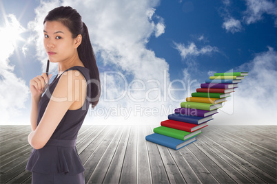 Composite image of thoughtful businesswoman