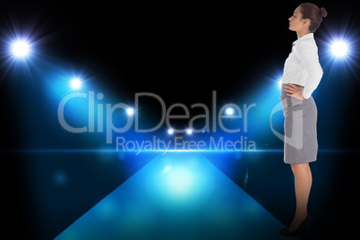 Composite image of focused businesswoman