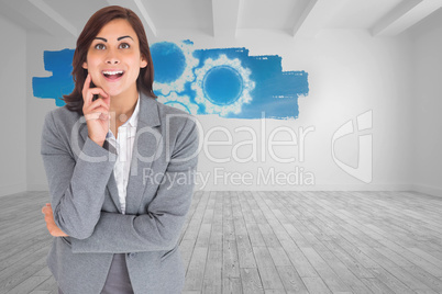 Composite image of smiling thoughtful businesswoman