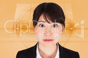 Composite image of serious businesswoman