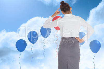 Composite image of businesswoman scratching her head