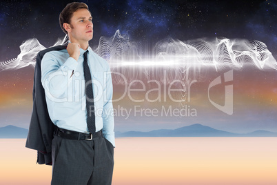 Composite image of serious businessman holding his jacket