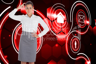 Composite image of focused businesswoman