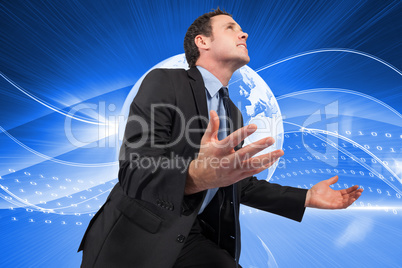 Composite image of businessman posing with arms out