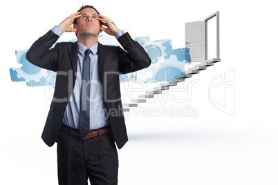 Composite image of stressed businessman with hands on head