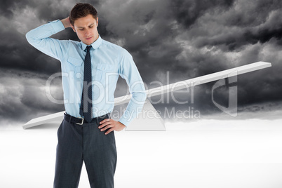 Composite image of thinking businessman with hand on head