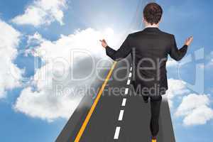 Composite image of businessman posing with arms out