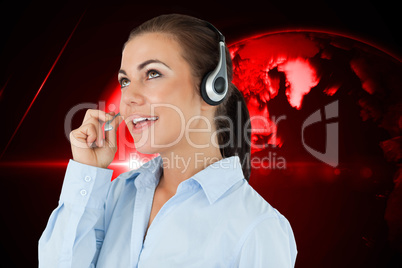 Composite image of call center agent looking upwards while talki