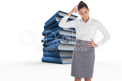 Composite image of focused businesswoman