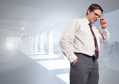 Composite image of thinking businessman touching his glasses