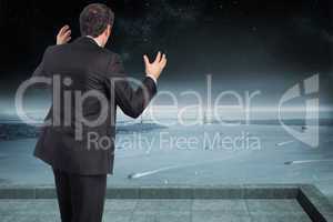 Composite image of stressed businessman gesturing