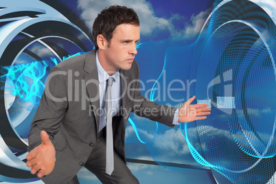 Composite image of businessman posing with hands out