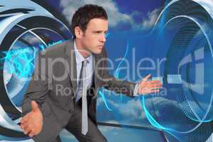 Composite image of businessman posing with hands out