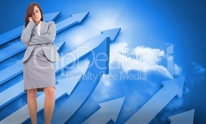 Composite image of focused businesswoman