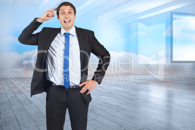 Composite image of thinking businessman scratching head