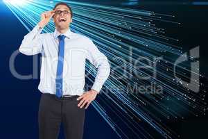 Composite image of thinking businessman tilting glasses