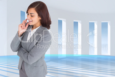 Composite image of smiling thoughtful businesswoman