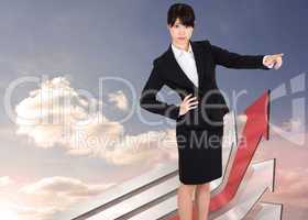 Composite image of businesswoman pointing