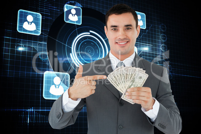 Composite image of businessman pointing at bank notes in his han