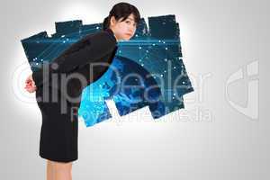 Composite image of serious businesswoman bending