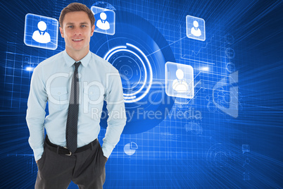 Composite image of happy businessman standing with hands in pock