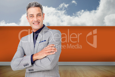 Composite image of smiling confident businessman