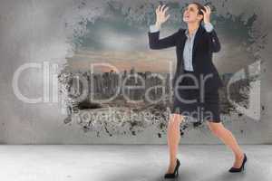 Composite image of angry businesswoman gesturing