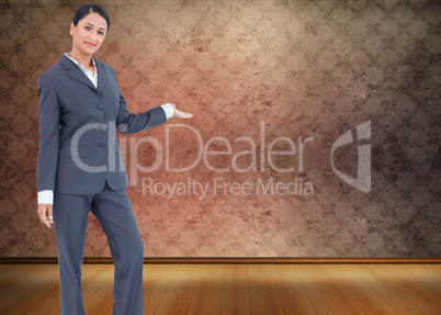 Composite image of standing businesswoman presenting