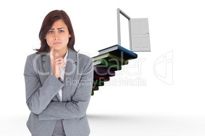 Composite image of worried businesswoman