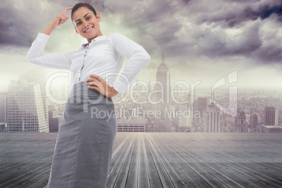 Composite image of smiling thoughtful businesswoman