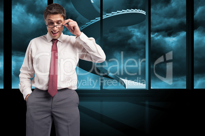 Composite image of thinking businessman touching his glasses