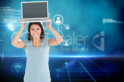 Composite image of gorgeous woman posing with her laptop