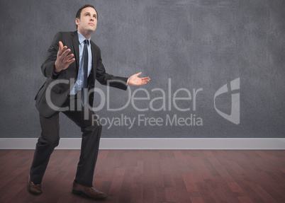 Composite image of businessman posing with arms outstretched