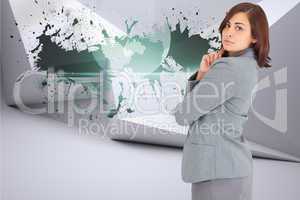 Composite image of concentrating businesswoman