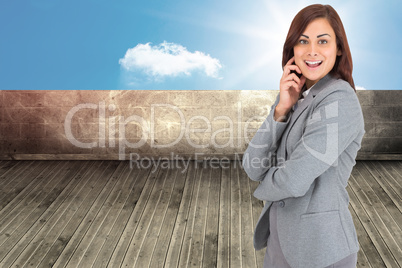 Composite image of happy businesswoman