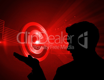 Composite image of shiny red copyright icon on black background