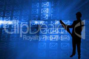 Composite image of glowing envelopes on blue background