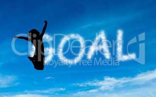 Composite image of goal written in white in sky