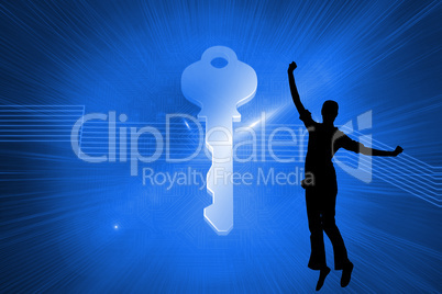 Composite image of glowing key on blue background