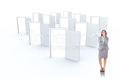 Composite image of focused businesswoman