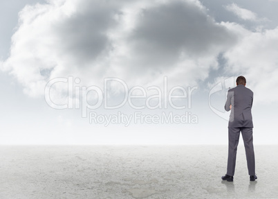 Composite image of thinking businessman holding glasses