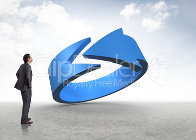 Composite image of smiling businessman with hands on hips Composite image of smiling businessman with hands on hips