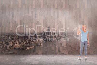 Composite image of charming woman pointing