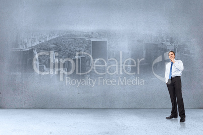 Composite image of thinking businessman touching chin