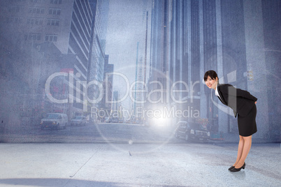 Composite image of smiling businesswoman bending